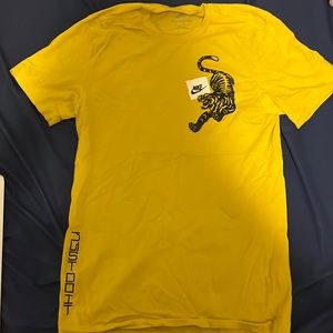 Yellow Nike shirt